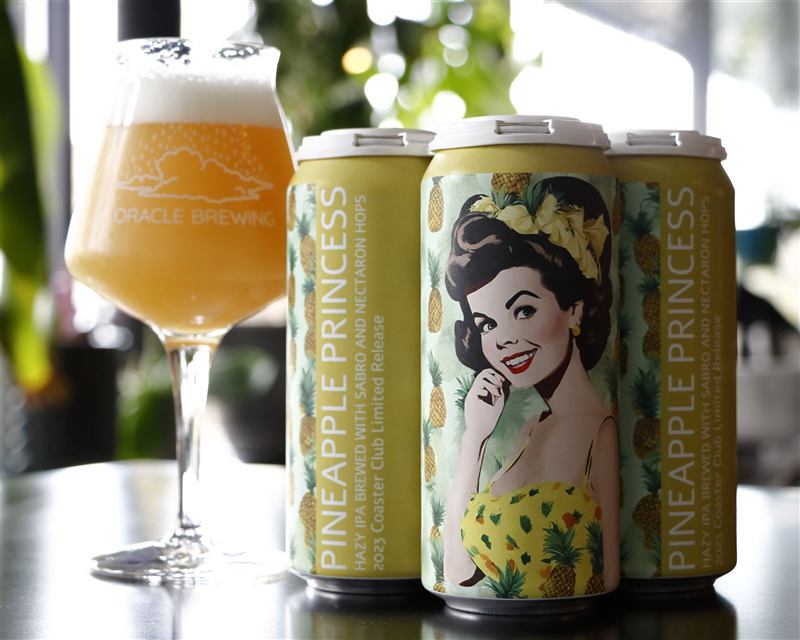 Pineapple Princess cans and a tulip glass